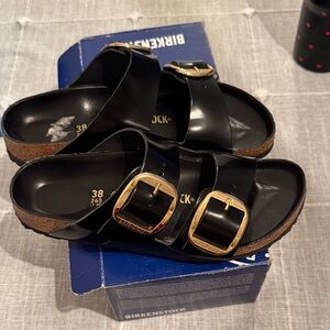 Birkenstock Black Slides with Gold Accents